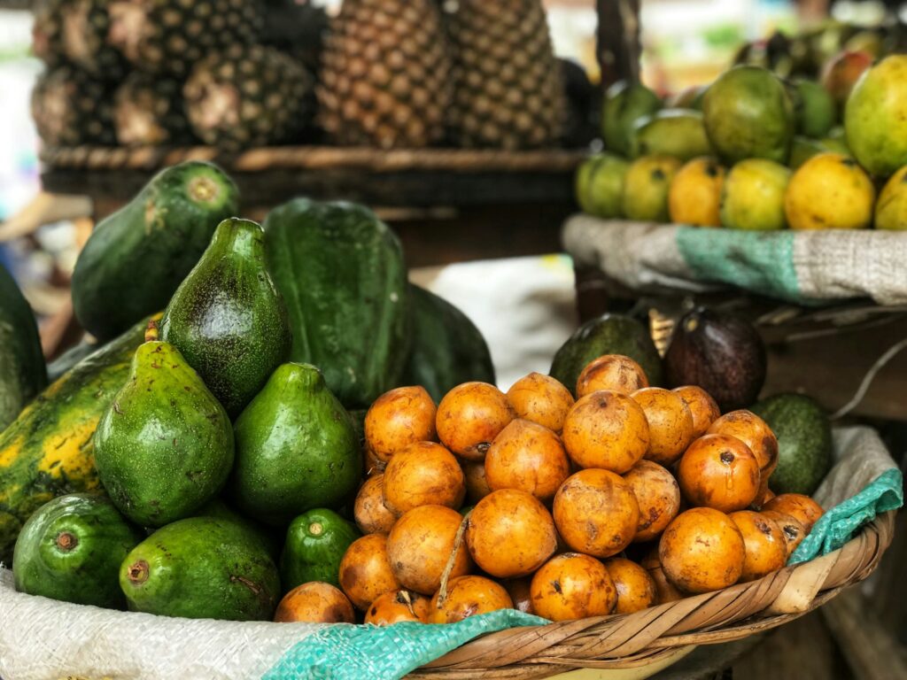 selective focus photography of displayed fruits